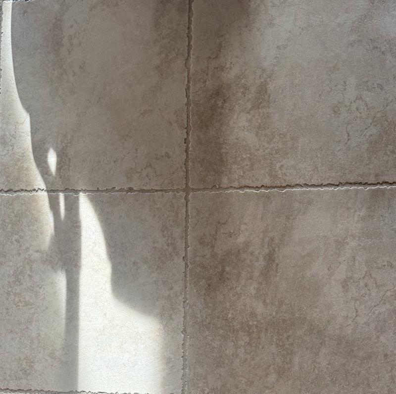 Before and after tile and grout cleaning on a Utah County tile floor