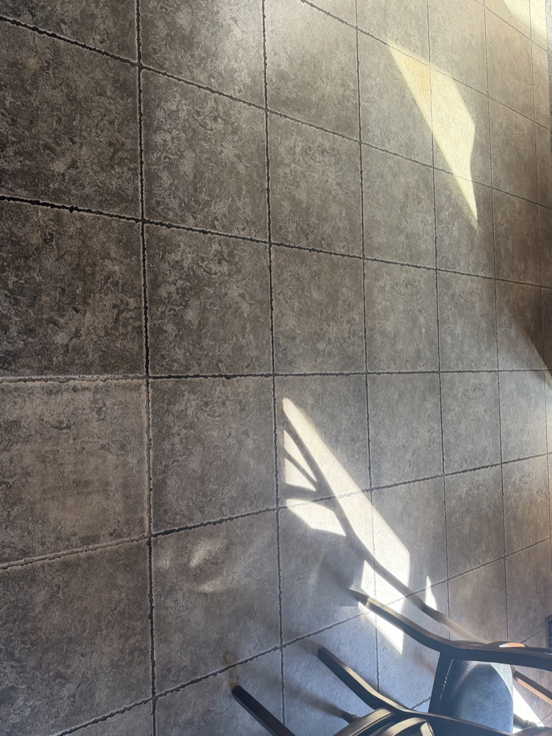 Kitchen tile floor before cleaning
